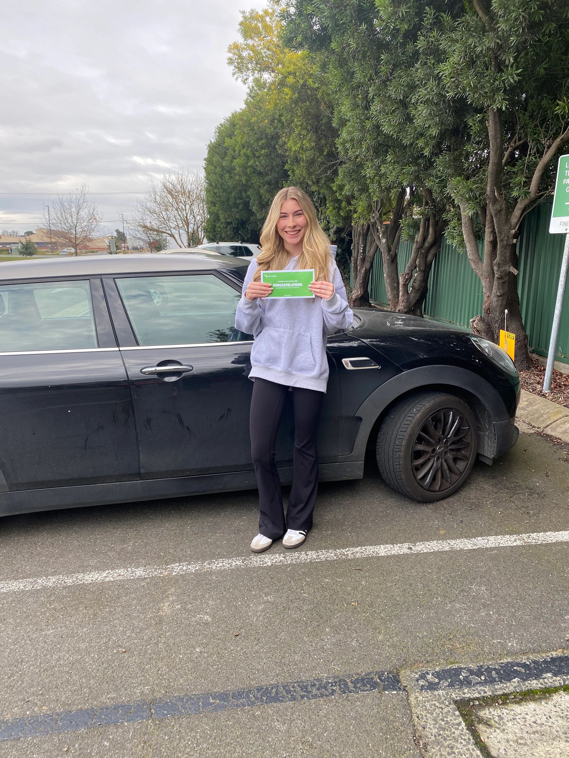Student with certificate